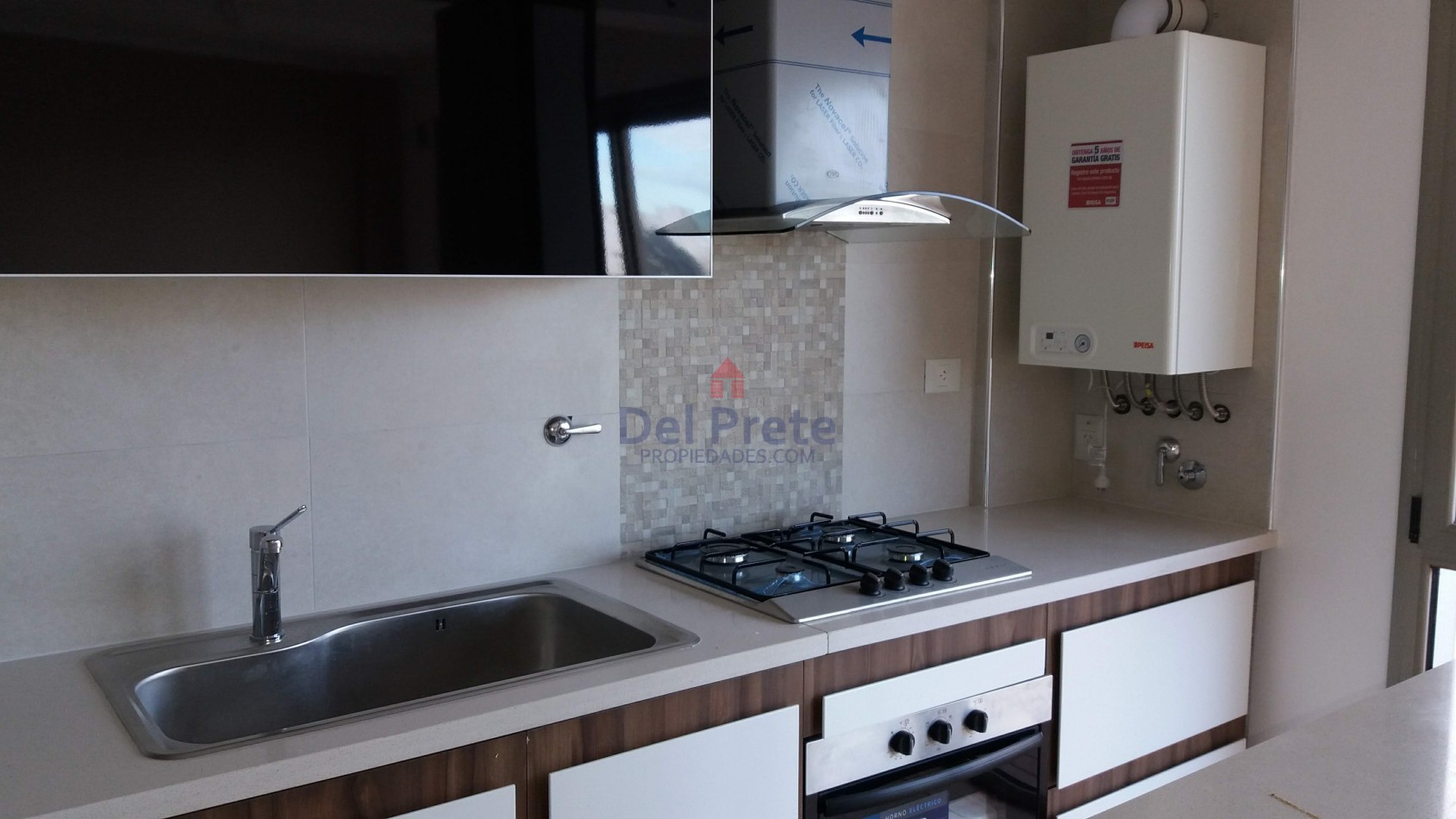 Venta 2 ambientes  Plaza Mitre   cochera 